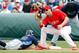 CLEARWATER, FL - MARCH 06: First baseman Matt Rizzotti #76 of the Philadelphia Phillies takes the throw at first as Joe Inglett #79 of the Tampa Bay Rays gets back safely during a Grapefruit League Spring Training Game at Bright House Field on March 6, 2011 in Sarasota, Florida. (Photo by J. Meric/Getty Images)