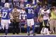 INDIANAPOLIS, IN - DECEMBER 22: Reggie Wayne #87 of the Indianapolis Colts celebrates after catching the game-winning touchdown pass against Kareem Jackson #25 of the Houston Texans at Lucas Oil Stadium on December 22, 2011 in Indianapolis, Indiana. The Colts defeated the Texans 19-16. (Photo by Joe Robbins/Getty Images)