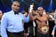 LAS VEGAS, NV - JUNE 09: Timothy Bradley (R) has his hand raised in victory after defeating Manny Pacquiao by split decision to win the WBO welterweight championship at MGM Grand Garden Arena on June 9, 2012 in Las Vegas, Nevada. (Photo by Kevork Djansezian/Getty Images)