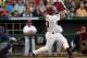 OMAHA, NE - JUNE 28: Christian Walker #13 of the South Carolina Gamecocks at bat against the Florida Gators during game 2 of the men's 2011 NCAA College Baseball World Series at TD Ameritrade Park Omaha on June 28, 2011 in Omaha, Nebraska. (Photo by Ronald Martinez/Getty Images)