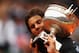 PARIS, FRANCE - JUNE 11: Rafael Nadal of Spain poses with the Coupe des Mousquetaires trophy in the men's singles final against Novak Djokovic of Serbia during day 16 of the French Open at Roland Garros on June 11, 2012 in Paris, France. (Photo by Clive Brunskill/Getty Images)