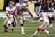 INDIANAPOLIS, IN - FEBRUARY 05: Rob Gronkowski #87 of the New England Patriots gets tackled by Kenny Phillips #21 and Chase Blackburn #93 of the New York Giants during Super Bowl XLVI at Lucas Oil Stadium on February 5, 2012 in Indianapolis, Indiana. (Photo by Jeff Gross/Getty Images)