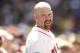 BOSTON, MA - JUNE 24: Kevin Youkilis #20 of the Boston Red Sox looks on from the dugout during the fourth inning of the interleague game against the Atlanta Braves at Fenway Park on June 24, 2012 in Boston, Massachusetts. (Photo by Winslow Townson/Getty Images)