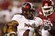 FAYETTEVILLE, AR - SEPTEMBER 17: Chris Anderson #4 of the Troy Trojans runs the ball against the Arkansas Razorbacks at Donald W. Reynolds Razorback Stadium on September 17, 2011 in Fayetteville, Arkansas. The Razorbacks beat the Trojans 38 to 28. (Photo by Wesley Hitt/Getty Images)