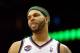 NEWARK, NJ - APRIL 10: Deron Williams #8 of the New Jersey Nets looks on in the second half against the Philadelphia 76ers at Prudential Center on April 10, 2012 in Newark, New Jersey. NOTE TO USER: User expressly acknowledges and agrees that, by downloading and or using this photograph, User is consenting to the terms and conditions of the Getty Images License Agreement. (Photo by Chris Chambers/Getty Images)