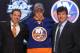 PITTSBURGH, PA - JUNE 22: Griffin Reinhart, fourth overall pick by the New York Islanders, poses on stage with Islanders representatives during Round One of the 2012 NHL Entry Draft at Consol Energy Center on June 22, 2012 in Pittsburgh, Pennsylvania. (Photo by Bruce Bennett/Getty Images)