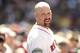 BOSTON, MA - JUNE 24: Kevin Youkilis #20 of the Boston Red Sox looks on from the dugout during the fourth inning of the interleague game against the Atlanta Braves at Fenway Park on June 24, 2012 in Boston, Massachusetts. (Photo by Winslow Townson/Getty Images)