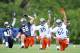 LAKE FOREST, IL - MAY 12: Wide receiver Alshon Jeffery #17 (L-R), offensive tackle Trevor Olson #68, safety Brandon Hardin #35 and offensive guard Nick Pieschel #62 of the Chicago Bears stretch during rookie minicamp at Halas Hall on May 12, 2012 in Chicago, Illinois. (Photo by Brian Kersey/Getty Images)