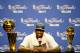 MIAMI, FL - JUNE 21: LeBron James #6 of the Miami Heat answers questions from the media next to the Larry O'Brien Finals Championship trophy and James' Bill Russell Finals MVP trophy during his post game press conference after they won 121-106 against the Oklahoma City Thunder in Game Five of the 2012 NBA Finals on June 21, 2012 at American Airlines Arena in Miami, Florida. NOTE TO USER: User expressly acknowledges and agrees that, by downloading and or using this photograph, User is consenting to the terms and conditions of the Getty Images License Agreement. (Photo by Ronald Martinez/Getty Images)