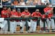 OMAHA, NE - JUNE 24: The Arizona Wildcats dugout celebrate a 3-0 lead in the fourth inning against the South Carolina Gamecocks during game 1 of the College World Series at TD Ameritrade Field on June 24, 2012 in Omaha, Nebraska. (Photo by Harry How/Getty Images)