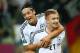 GDANSK, POLAND - JUNE 22: Marco Reus of Germany celebrates scoring their fourth goal with Mesut Ozil of Germany during the UEFA EURO 2012 quarter final match between Germany and Greece at The Municipal Stadium on June 22, 2012 in Gdansk, Poland. (Photo by Alex Grimm/Getty Images)