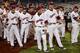 OMAHA, NE - JUNE 25: The South Carolina Gamecocks team wait on the field after losing 4-1 and 2-0 in the series to the Arizona Wildcats after game 2 of the College World Series at TD Ameritrade Field on June 25, 2012 in Omaha, Nebraska. (Photo by Harry How/Getty Images)