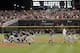 OMAHA, NE - JUNE 25: The Arizona Wildcats team celebrates a 4-1 win and a 2-0 series sweep of the South Carolina Gamecocks during game 2 of the College World Series at TD Ameritrade Field on June 25, 2012 in Omaha, Nebraska. (Photo by Harry How/Getty Images)