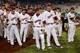 OMAHA, NE - JUNE 25: The South Carolina Gamecocks team wait on the field after losing 4-1 and 2-0 in the series to the Arizona Wildcats after game 2 of the College World Series at TD Ameritrade Field on June 25, 2012 in Omaha, Nebraska. (Photo by Harry How/Getty Images)