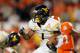 MIAMI GARDENS, FL - JANUARY 04: Tavon Austin #1 of the West Virginia Mountaineers runs the ball against the Clemson Tigers during the Discover Orange Bowl at Sun Life Stadium on January 4, 2012 in Miami Gardens, Florida. (Photo by Streeter Lecka/Getty Images)