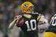 GREEN BAY, WI - DECEMBER 11: Matt Flynn #10 of the Green Bay Packers passes against the Oakland Raiders at Lambeau Field on December 11, 2011 in Green Bay, Wisconsin. The Packers defeated the Raiders 46-16. (Photo by Jonathan Daniel/Getty Images)