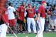 PHOENIX, AZ - APRIL 16: Arizona Cardinals Football player Larry Fitzgerald gets a few tips from Stephen Drew #6 of the Arizona Diamondback prior to a game against the Pittsburgh Pirates at Chase Field on April 16, 2012 in Phoenix, Arizona. (Photo by Norm Hall/Getty Images)