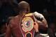 LAS VEGAS, NV - JUNE 09: Timothy Bradley celebrates with his belt after defeating Manny Pacquiao by split decision in their WBO welterweight title fight at MGM Grand Garden Arena on June 9, 2012 in Las Vegas, Nevada. (Photo by Jeff Bottari/Getty Images)