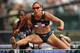 EUGENE, OR - JULY 05: Lolo Jones competes in the women's 110 meter hurdle heats during day seven of the U.S. Track and Field Olympic Trials at Hayward Field on July 5, 2008 in Eugene, Oregon. (Photo by Jonathan Ferrey/Getty Images)
