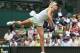 LONDON, ENGLAND - JUNE 25: Maria Sharapova of Russia serves during her womens singles first round match against Anastasia Rodionova of Australia on day one of the Wimbledon Lawn Tennis Championships at the All England Lawn Tennis and Croquet Club on June 25, 2012 in London, England. (Photo by Julian Finney/Getty Images)
