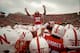 LINCOLN, NE - NOVEMBER 25: Cornerback Marcus Mendoza #32 of the Nebraska Cornhuskers jumps atop a pre game scrum as the Nebraska Cornhuskers prepare to plan the Iowa Hawkeyes at Memorial Stadium November 25, 2011 in Lincoln, Nebraska. Nebraska defeated Iowa 20-7. (Photo by Eric Francis/Getty Images)