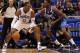 ORLANDO, FL - MARCH 30: Dwight Howard #12 of the Orlando Magic drives aganst Ian Mahinmi #28 of the Dallas Mavericks during the game at Amway Center on March 30, 2012 in Orlando, Florida. NOTE TO USER: User expressly acknowledges and agrees that, by downloading and or using this photograph, User is consenting to the terms and conditions of the Getty Images License Agreement. (Photo by Sam Greenwood/Getty Images)