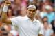 LONDON, ENGLAND - JUNE 27: Roger Federer of Switzerland celebrates match point during his Gentlemen's Singles second round match against Fabio Fognini of Italy on day three of the Wimbledon Lawn Tennis Championships at the All England Lawn Tennis and Croquet Club on June 27, 2012 in London, England. (Photo by Paul Gilham/Getty Images)