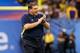 NEW ORLEANS, LA - JANUARY 03: Head coach Brady Hoke of the Michigan Wolverines applauds his teams play against the Virginia Tech Hokies during the Allstate Sugar Bowl at Mercedes-Benz Superdome on January 3, 2012 in New Orleans, Louisiana. (Photo by Kevin C. Cox/Getty Images)