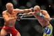 LAS VEGAS - JULY 11: (L-R) Georges St. Pierre battles Thiago Alves during their welterweight title bout during UFC 100 on July 11, 2009 in Las Vegas, Nevada. (Photo by Jon Kopaloff/Getty Images)