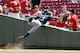 CINCINNATI, OH - JUNE 27: Nyjer Morgan #2 of the Milwaukee Brewers battles for a foul ball with a fan in the ninth inning of the game against the Cincinnati Reds at Great American Ball Park on June 27, 2012 in Cincinnati, Ohio. The Brewers won 8-4. (Photo by Joe Robbins/Getty Images)