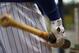 MILWAUKEE,WI - APRIL 20: A baseball glove and bat of Rickie Weeks #23 of the Milwaukee Brewers is shown before Colorado Rockies v Milwaukee Brewers at Miller Park on April 20, 2012 in Milwaukee, Wisconsin. (Photo by Jeffrey Phelps/Getty Images)