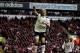 LIVERPOOL, ENGLAND - MAY 15: Luka Modric of Spurs cedlebrates after scoring his team's second goal from the penalty spot during the Barclays Premier League match between Liverpool and Tottenham Hotspur at Anfield on May 15, 2011 in Liverpool, England. (Photo by Michael Steele/Getty Images)