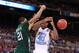 ST. LOUIS, MO - MARCH 23: Harrison Barnes #40 of the North Carolina Tar Heels loses the ball in the second half as he is defended by Jon Smith #21 of the Ohio Bobcats during the 2012 NCAA Men's Basketball Midwest Regional Semifinal at Edward Jones Dome on March 23, 2012 in St. Louis, Missouri. (Photo by Andy Lyons/Getty Images)