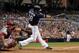 SAN DIEGO, CA - JUNE 2: Carlos Quentin #18 of the San Diego Padres hits a single against the Arizona Diamondbacks during their MLB Baseball Game on June 2, 2012 at Petco Park in San Diego, California. (Photo by Donald Miralle/Getty Images)