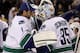 BOSTON, MA - JANUARY 07: Roberto Luongo #1 congratulates Cory Schneider #35 of the Vancouver Canucks after the win over the Boston Bruins on January 7, 2012 at TD Garden in Boston, Massachusetts. The Vancouver Canucks defeated the Boston Bruins 4-3. (Photo by Elsa/Getty Images)
