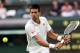 LONDON, ENGLAND - JUNE 29: Novak Djokovic of Serbia hits a backhand return during his Gentlemen's Singles third round match against Radek Stepanek of Czech Republic on day five of the Wimbledon Lawn Tennis Championships at the All England Lawn Tennis and Croquet Club on June 29, 2012 in London, England. (Photo by Julian Finney/Getty Images)
