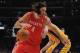 LOS ANGELES, CA - APRIL 06: Luis Scola #4 of the Houston Rockets spins free from Paul Gasol #16 of the Los Angeles Lakers during a 112-107 Rocets win at Staples Center on April 6, 2012 in Los Angeles, California. NOTE TO USER: User expressly acknowledges and agrees that, by downloading and or using this photograph, User is consenting to the terms and conditions of the Getty Images License Agreement. (Photo by Harry How/Getty Images)