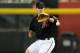 PHOENIX, AZ - JUNE 23: Aaron Hill #2 of the Arizona Diamondbacks makes a play on a ground ball against the Chicago Cubs at Chase Field on June 23, 2012 in Phoenix, Arizona. (Photo by Norm Hall/Getty Images)