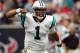 HOUSTON, TX - DECEMBER 18: Cam Newton #1 of the Carolina Panthers celebrates a touchdown against the Houston Texans at Reliant Stadium on December 18, 2011 in Houston, Texas. (Photo by Ronald Martinez/Getty Images)