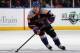 UNIONDALE, NY - NOVEMBER 23: P.A. Parenteau #15 of the New York Islanders skates against the Philadelphia Flyers at the Nassau Veterans Memorial Coliseum on November 23, 2011 in Uniondale, New York. (Photo by Bruce Bennett/Getty Images)