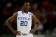 NEW ORLEANS, LA - MARCH 31: Doron Lamb #20 of the Kentucky Wildcats looks on while taking on the Louisville Cardinals during the National Semifinal game of the 2012 NCAA Division I Men's Basketball Championship at the Mercedes-Benz Superdome on March 31, 2012 in New Orleans, Louisiana. (Photo by Ronald Martinez/Getty Images)