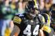 IOWA CITY, IA - OCTOBER 30: Line backer James Morris #44 of the the University of Iowa Hawkeyes celebrates after tackling running back Edwin Baker #4 of the Michigan State Spartans during the first half of play at Kinnick Stadium on October 30, 2010 in Iowa City, Iowa. Iowa won 37-6 over Michigan State. (Photo by David Purdy/Getty Images)
