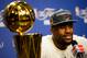 MIAMI, FL - JUNE 21: LeBron James #6 of the Miami Heat answers questions from the media next to the Larry O'Brien Finals Championship trophy during his post game press conference after they won 121-106 against the Oklahoma City Thunder in Game Five of the 2012 NBA Finals on June 21, 2012 at American Airlines Arena in Miami, Florida. NOTE TO USER: User expressly acknowledges and agrees that, by downloading and or using this photograph, User is consenting to the terms and conditions of the Getty Images License Agreement. (Photo by Ronald Martinez/Getty Images)