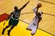 MIAMI, FL - JUNE 09: LeBron James #6 of the Miami Heat shoots over Brandon Bass #30 of the Boston Celtics in Game Seven of the Eastern Conference Finals in the 2012 NBA Playoffs on June 9, 2012 at American Airlines Arena in Miami, Florida. NOTE TO USER: User expressly acknowledges and agrees that, by downloading and or using this photograph, User is consenting to the terms and conditions of the Getty Images License Agreement. (Photo by J. Meric/Getty Images)