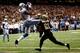 NEW ORLEANS, LA - JANUARY 07: Calvin Johnson #81 of the Detroit Lions makesa touchdown catch against Patrick Robinson #21 of the New Orleans Saints during their 2012 NFC Wild Card Playoff game at Mercedes-Benz Superdome on January 7, 2012 in New Orleans, Louisiana. (Photo by Chris Graythen/Getty Images)