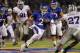 LAWRENCE, KS - OCTOBER 14: Quarterback Jordan Webb #2 of the Kansas Jayhawks scrambles as David Garrett #27 of the Kansas State Wildcats defends during the game on October 14, 2010 at Memorial Stadium in Lawrence, Kansas. (Photo by Jamie Squire/Getty Images)