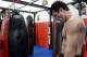 TUALATIN, OR - JUNE 26: Chael Sonnen takes a break during a workout at the Team Quest gym on June 26, 2012 in Tualatin, Oregon. Sonnen will fight Anderson Silva July 7, 2012 at UFC 148 in Las Vegas, Nevada. (Photo by Jonathan Ferrey/Getty Images)