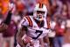 CHARLOTTESVILLE, VA - NOVEMBER 26: Marcus Davis #7 of the Virginia Tech Hokies runs with the ball against the Virginia Cavaliers at Scott Stadium on November 26, 2011 in Charlottesville, Virginia. (Photo by Geoff Burke/Getty Images)