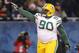 CHICAGO, IL - JANUARY 23: B.J. Raji #90 of the Green Bay Packers reacts after scoring on a 18-yard interception return for a touchdown in the fourth quarter against the Chicago Bears in the NFC Championship Game at Soldier Field on January 23, 2011 in Chicago, Illinois. (Photo by Andy Lyons/Getty Images)