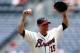 ATLANTA, GA - JULY 01: Tim Hudson #15 of the Atlanta Braves stretches his shoulders during the first inning against the Washington Nationals at Turner Field on July 1, 2012 in Atlanta, Georgia. (Photo by Kevin C. Cox/Getty Images)